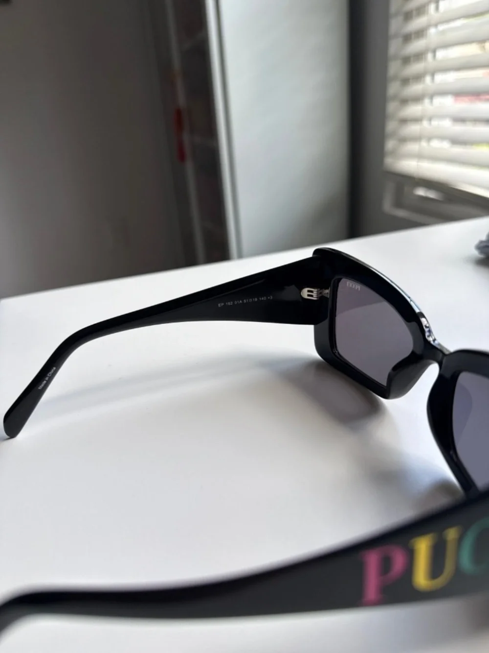 PUCCI Sunglasses EP 0162 in black with rainbow candy lettering